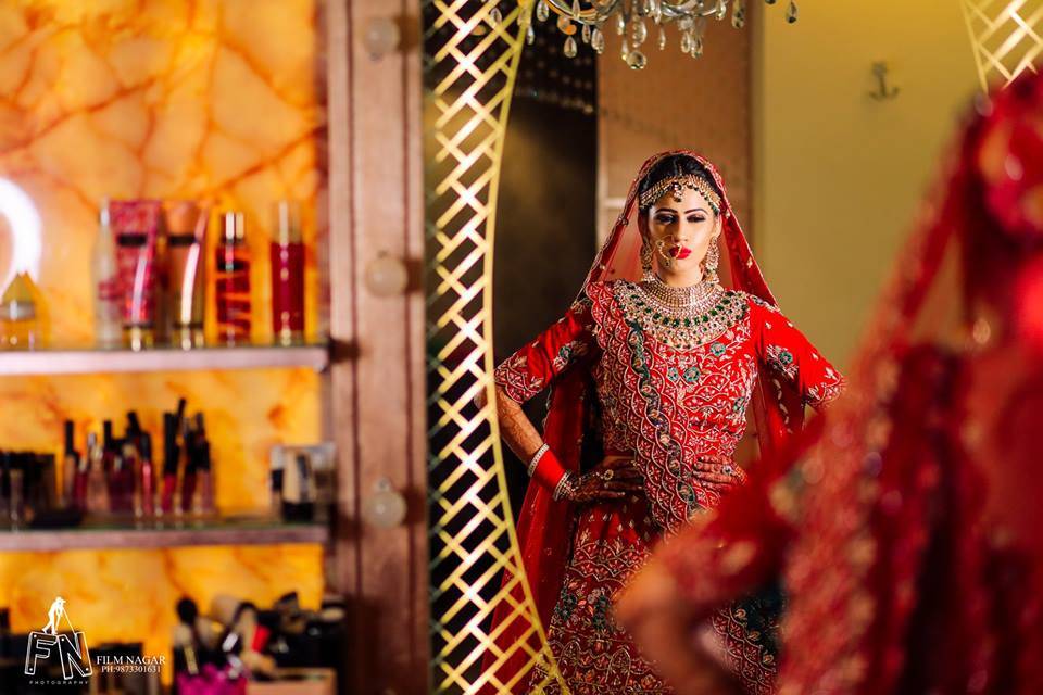 The Bridal Beauty Looking in Glass