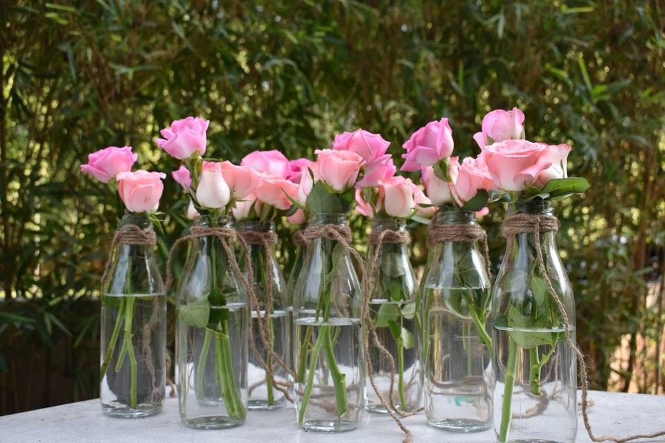 Floral with glass bottles