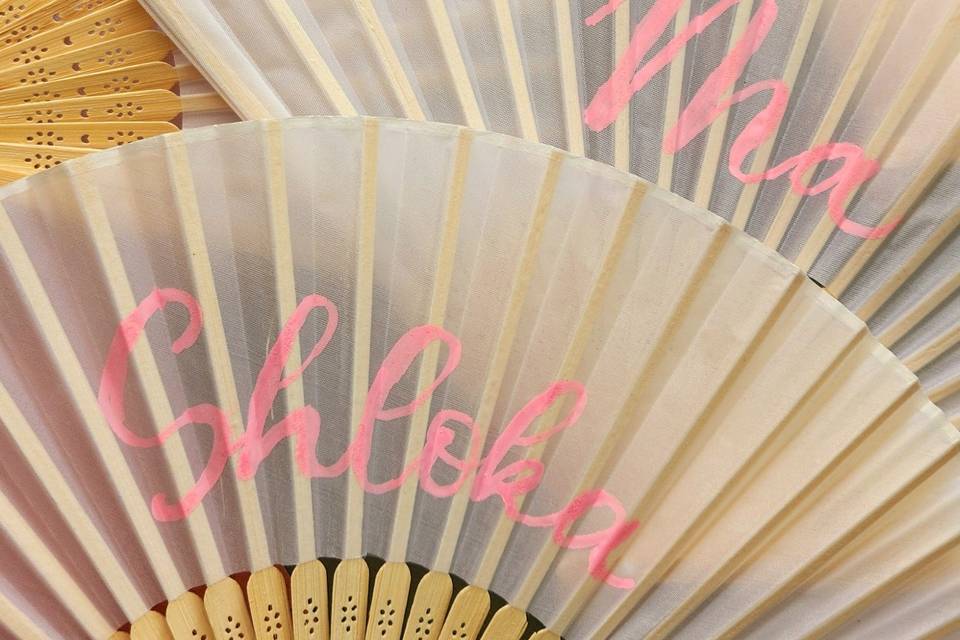 Hand fans with guests names