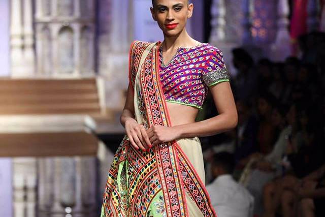 Sonam Kapoor exudes regal drama in heavily-embroidered multicoloured lehenga  set | Times of India