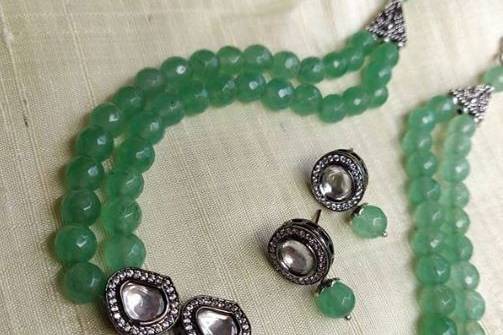 Soft green in victorian kundan