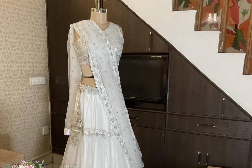 White net Lehnga with sequins