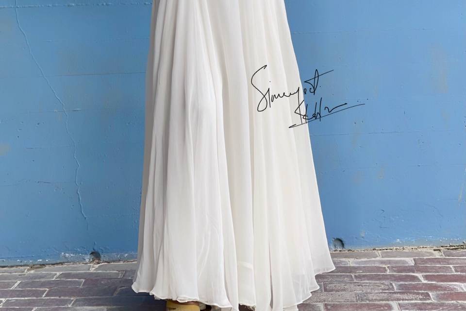 White gown with hand work.