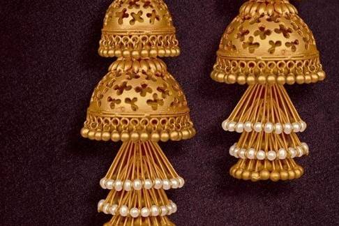 Gold jhumka pc on sale jewellers