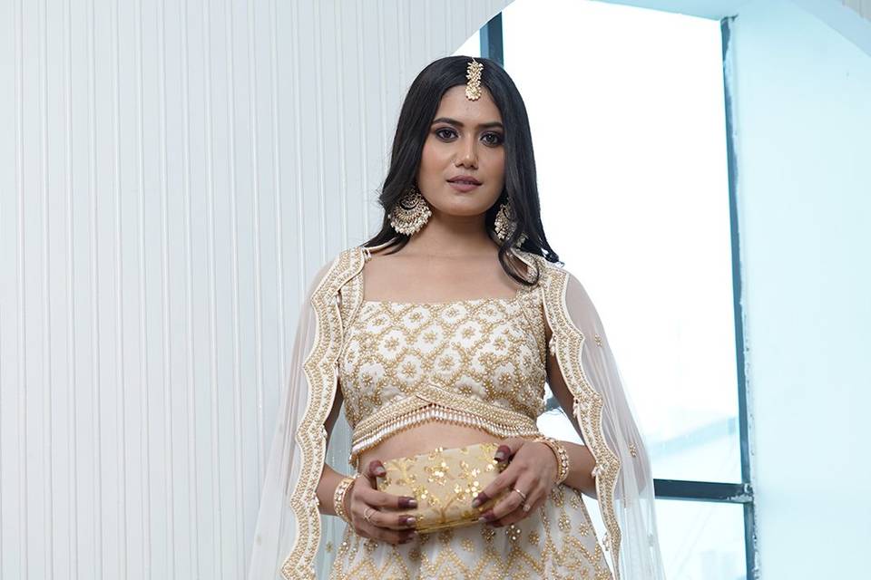 Ivory golden lehenga on rent