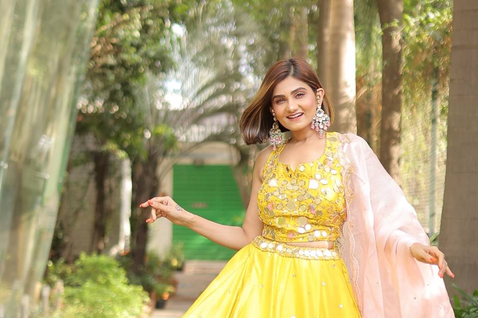 Trendy yellow lehenga on rent