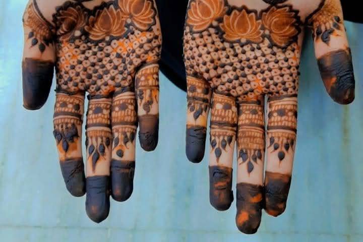 Peacock with lotus mehndi