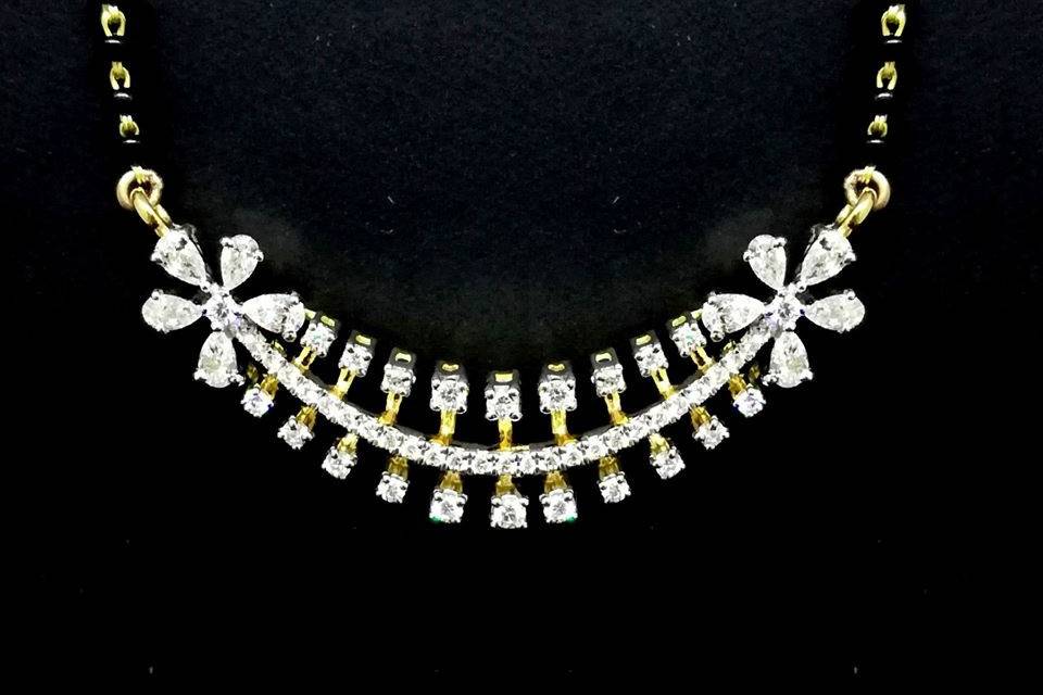 Flaming Om Diamond Jewellery