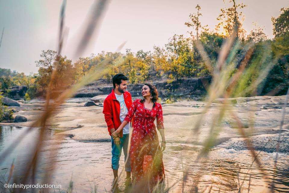 Family portrait by the river -