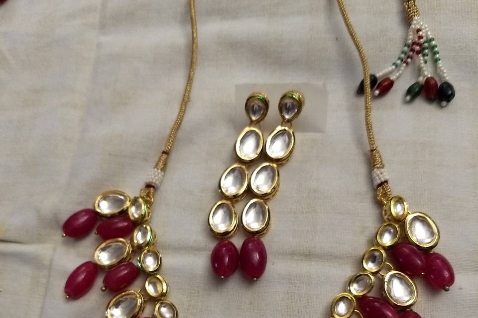 Kundans with ruby stones