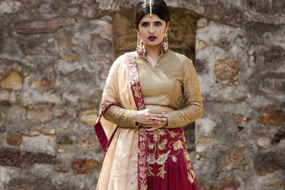 Carmine and gold lehenga