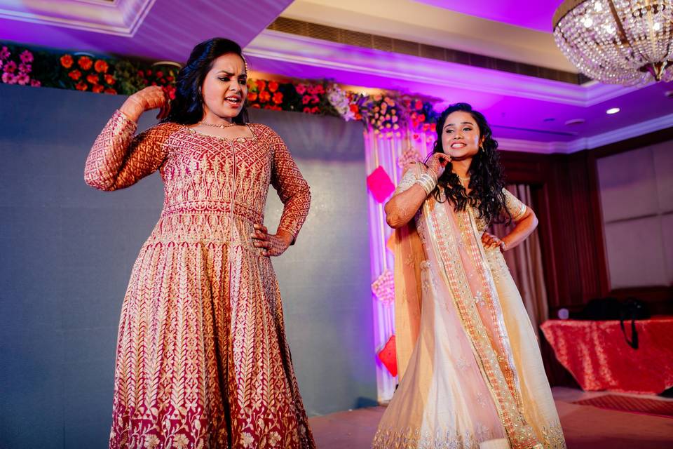 Bride and sister dance