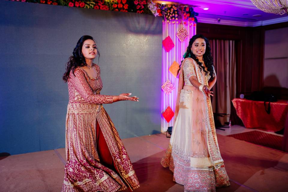 Bride and sister dance