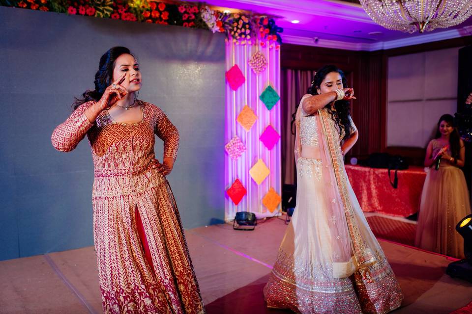 Bride and sister dance