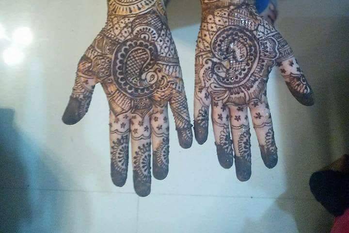 Khushi Mehendi Designer