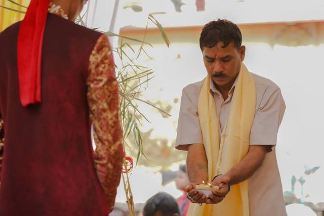 Groom performing the wedding ritual