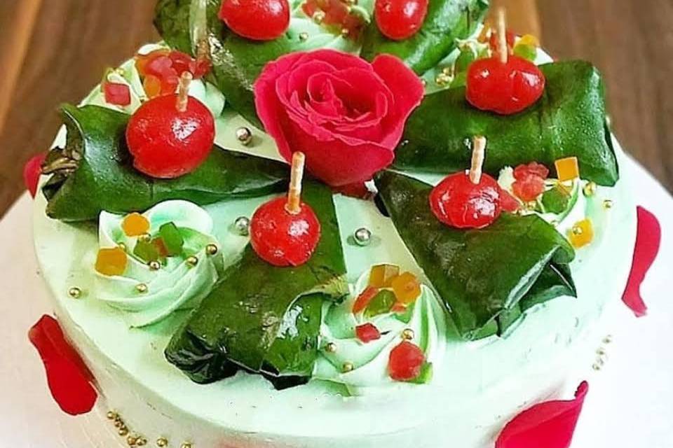 A Refreshing Green Paan Cake with Basket Decoration , Paan Mix, Cherries  and White Chocolate Paan Leafs Stock Image - Image of paan, decoration:  206298035